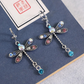 Stijlvolle Zilveren Dragonfly Oorbellen met Elegante Snede