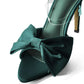 Elegante slingback met hoge hakken en strikje
