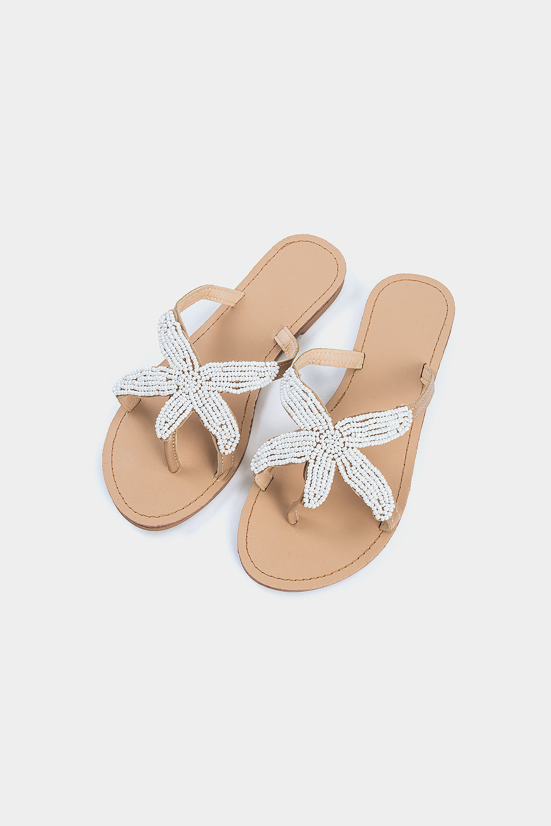 Zachte wollenslippers met parels voor een elegante en comfortabele uitstraling