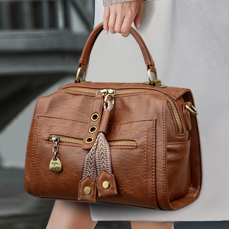 Dames schoudertas van synthetisch leer met metallic details - Juliette