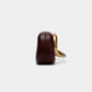 Chique Faux Leer Clutch met Stijlvolle Metalen Accenten