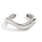 Unieke asymmetrische armband van metalen materiaal voor een stijlvolle uitstraling