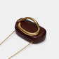 Chique Faux Leer Clutch met Stijlvolle Metalen Accenten