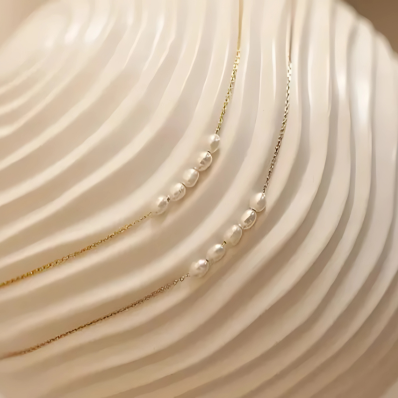 Verfraai je look met de elegante Verse Vijf-Parels Ketting - Victoria
