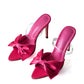 Elegante slingback met hoge hakken en strikje