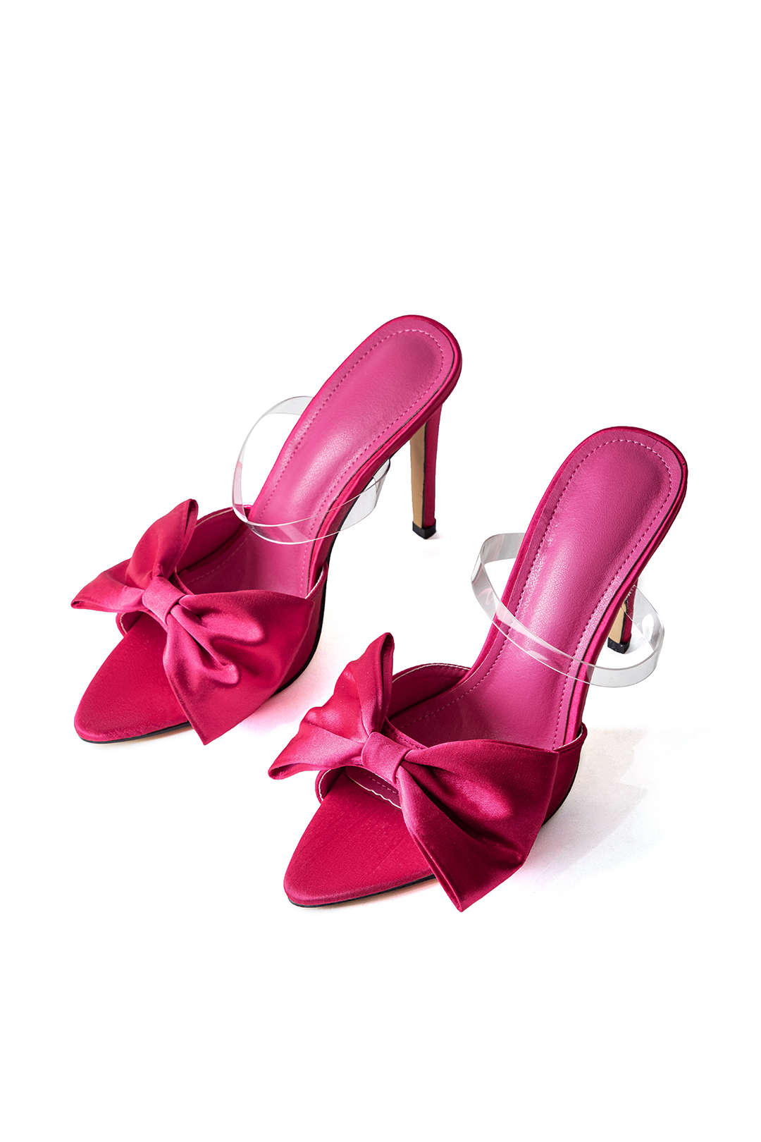 Elegante slingback met hoge hakken en strikje