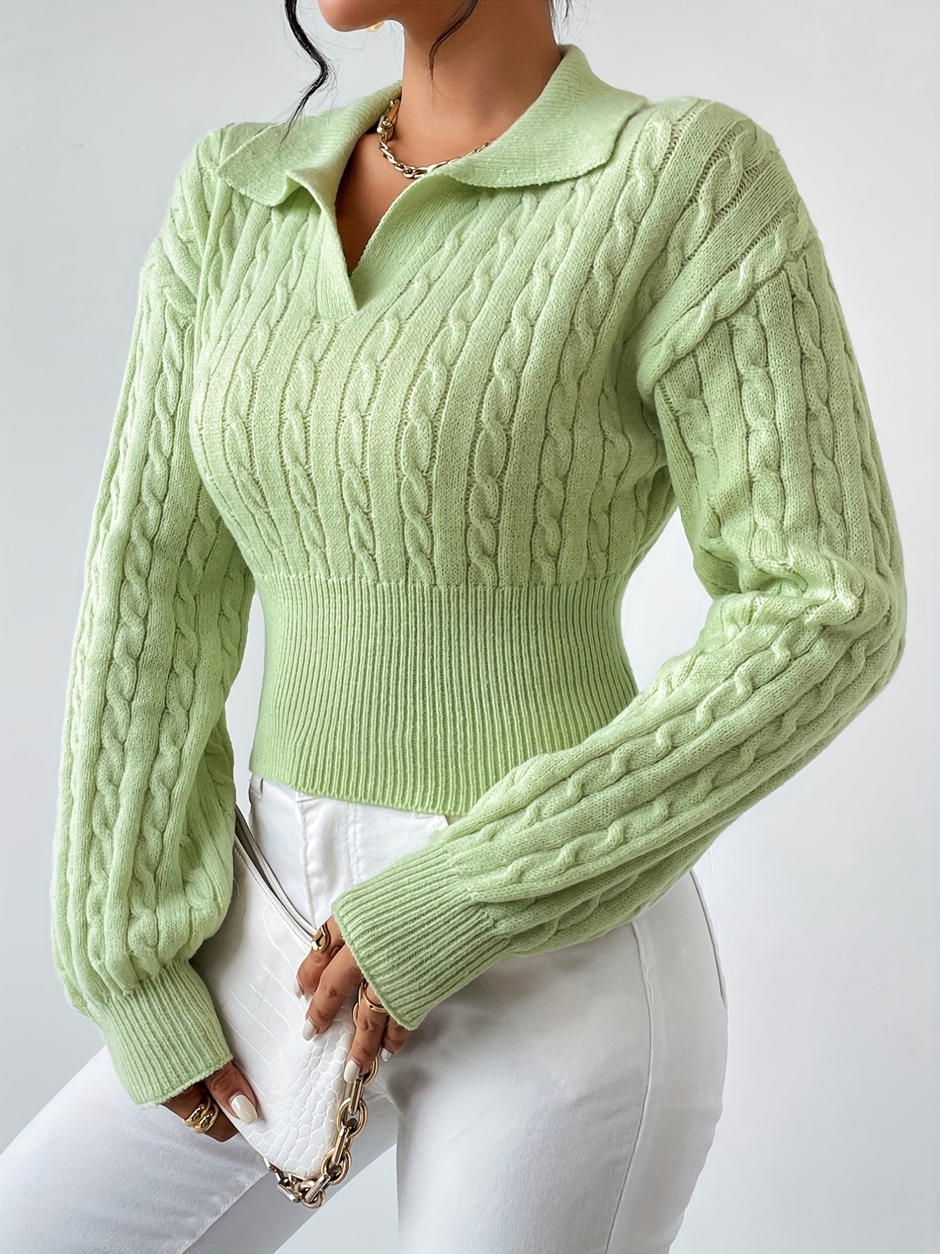 Stylish gebreide trui met een unieke gedraaide V-hals voor een verfijnde look
