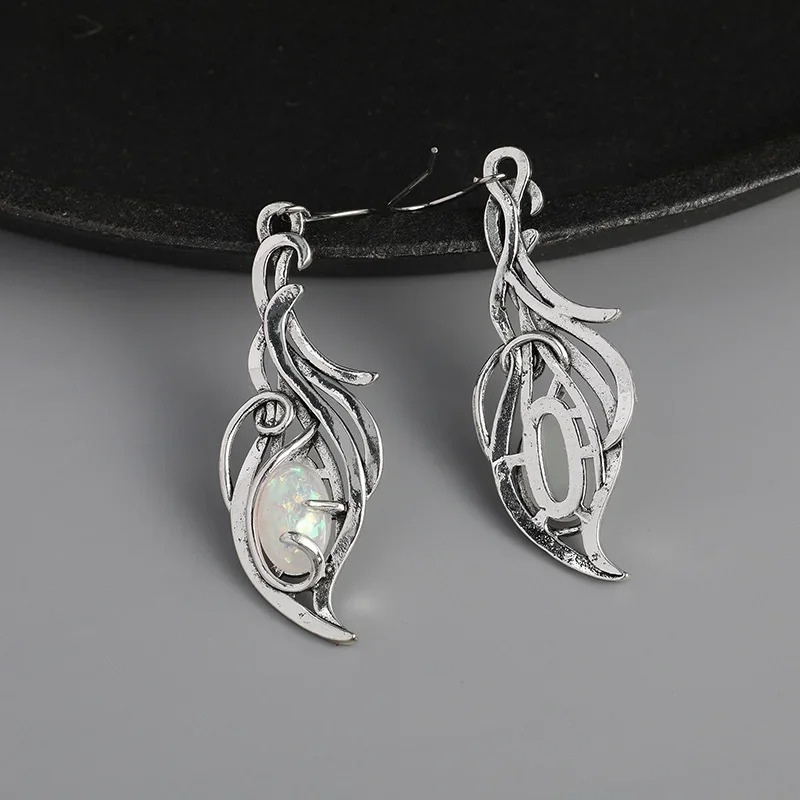 Elegante Ovale Vuur Opaal Oorbellen - Kelly voor een betoverende look