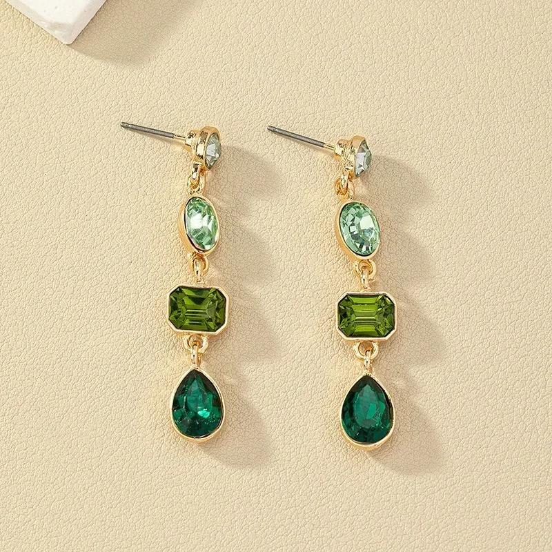 Gouden Oorbellen met Groene Kristallen - Hip