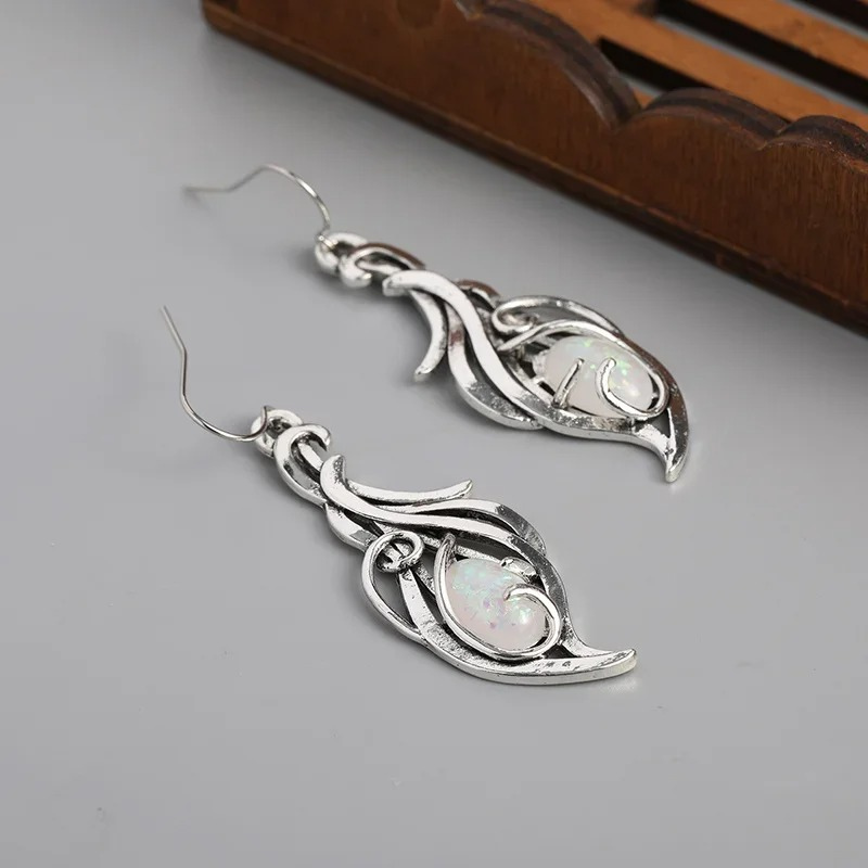 Elegante Ovale Vuur Opaal Oorbellen - Kelly voor een betoverende look