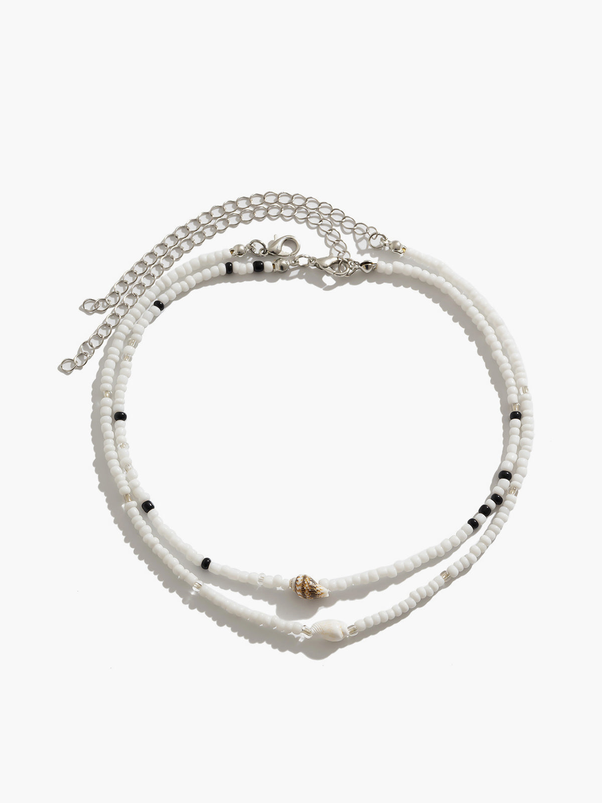 Draag de schoonheid van de zee met de elegante schelpenarmband