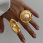 Elegante gouden parelring voor tijdloze elegantie