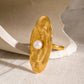 Elegante gouden parelring voor tijdloze elegantie
