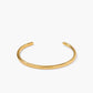 Elegante en verfijnde open goud armband
