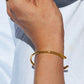 Elegante en verfijnde open goud armband