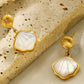 Elegante Gouden Parel- en Schelpenoorbellen voor een Tijdloze Look