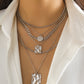 Elegante multi-rijige goudlaag ketting voor een stijlvolle uitstraling