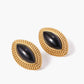 Oorbellen van gouden disku en zwarte onyx – elegante sieraden voor elke gelegenheid