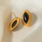 Oorbellen van gouden disku en zwarte onyx – elegante sieraden voor elke gelegenheid