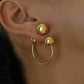 Elegante gouden bol studs en oorbellen voor een stijlvolle uitstraling