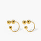Elegante gouden bol studs en oorbellen voor een stijlvolle uitstraling