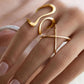 Gouden open spiraalring met onregelmatige vorm – Trendy modeaccessoire
