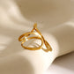 Gouden open spiraalring met onregelmatige vorm – Trendy modeaccessoire