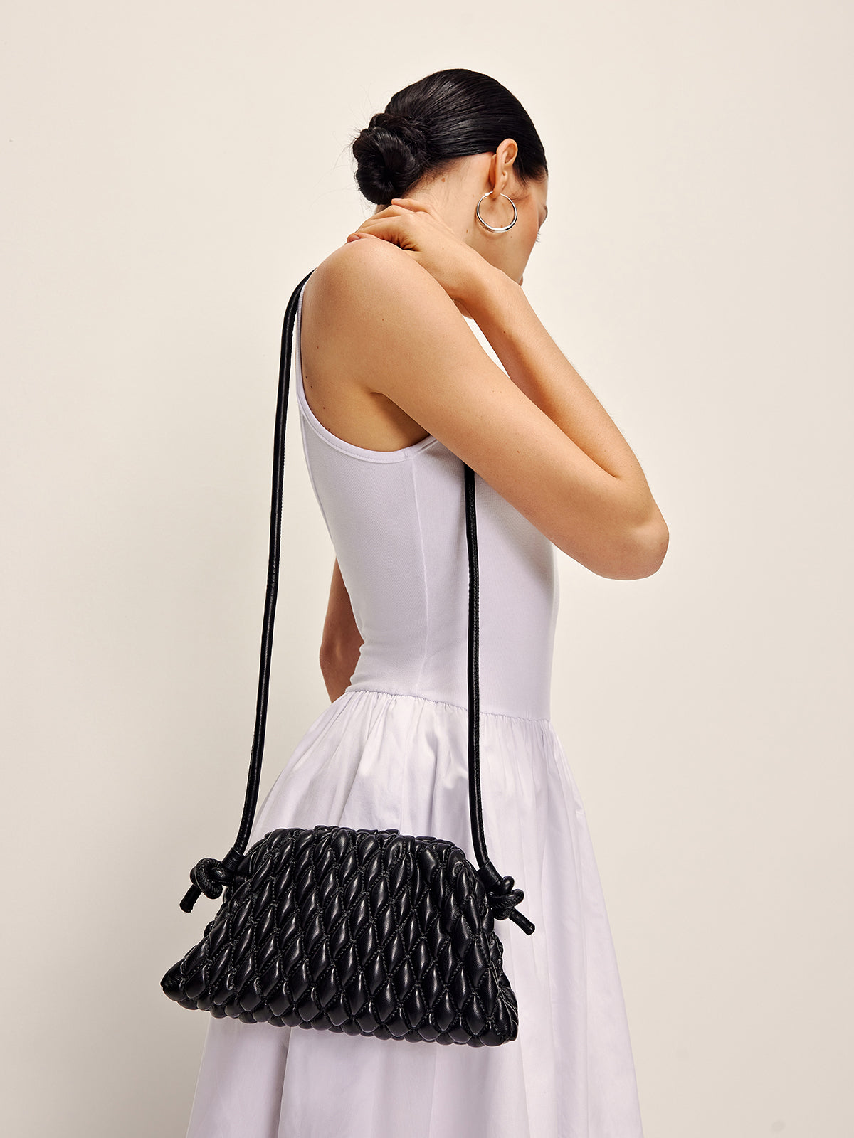 Elegante ruitvormige clutch en schouderdumdful tas voor stijlvolle gelegenheden