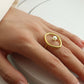 Gouden ring met zoetwaterparel in ovale en cirkelvorm voor een elegante uitstraling