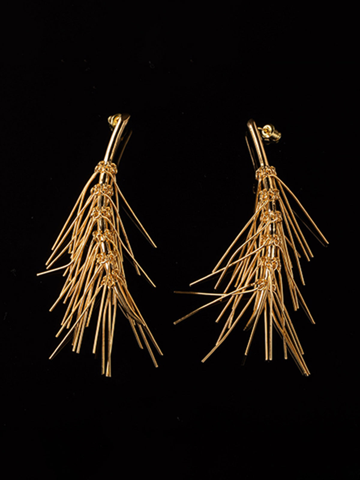 Elegante gouden kwast oorbellen
