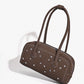Elegante handtas met strassversiering