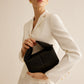 Chique Ronde Tas met Elegante Metalen Accenten