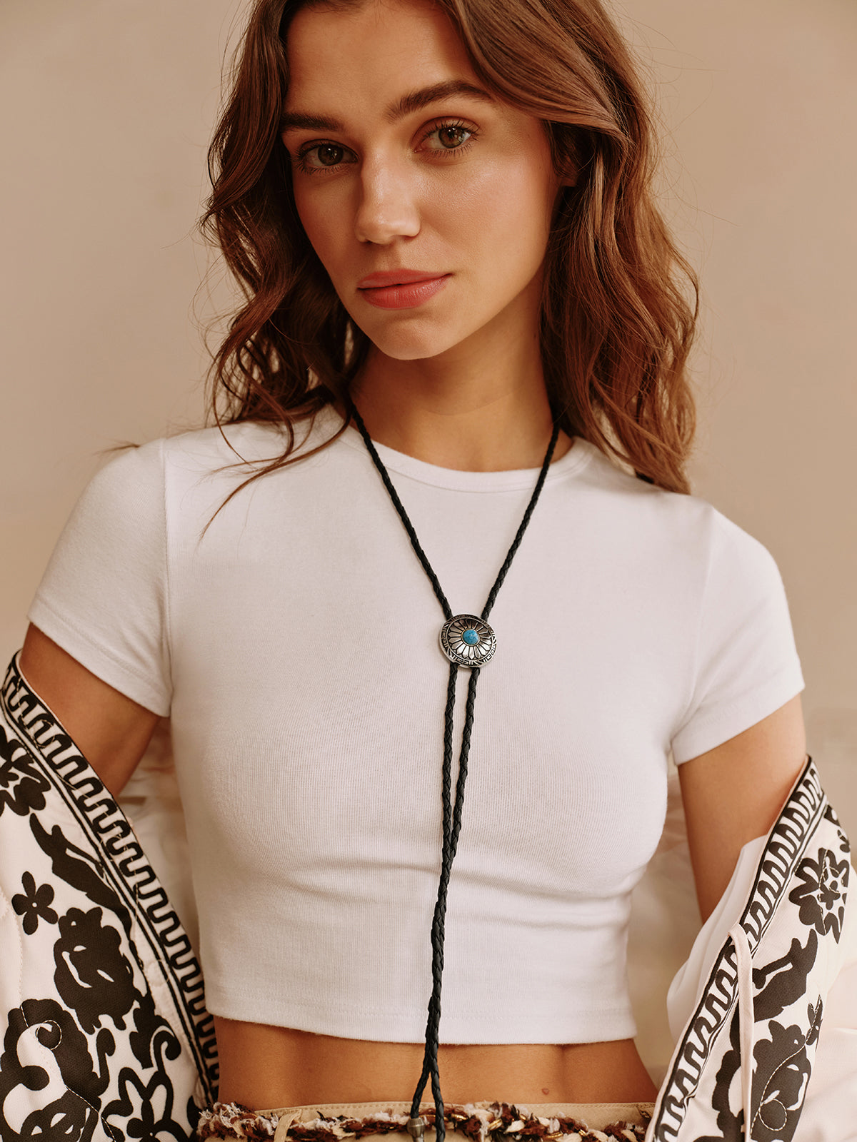 Vintage ketting met fleur-de-lis hanger in verfijnd turkoois