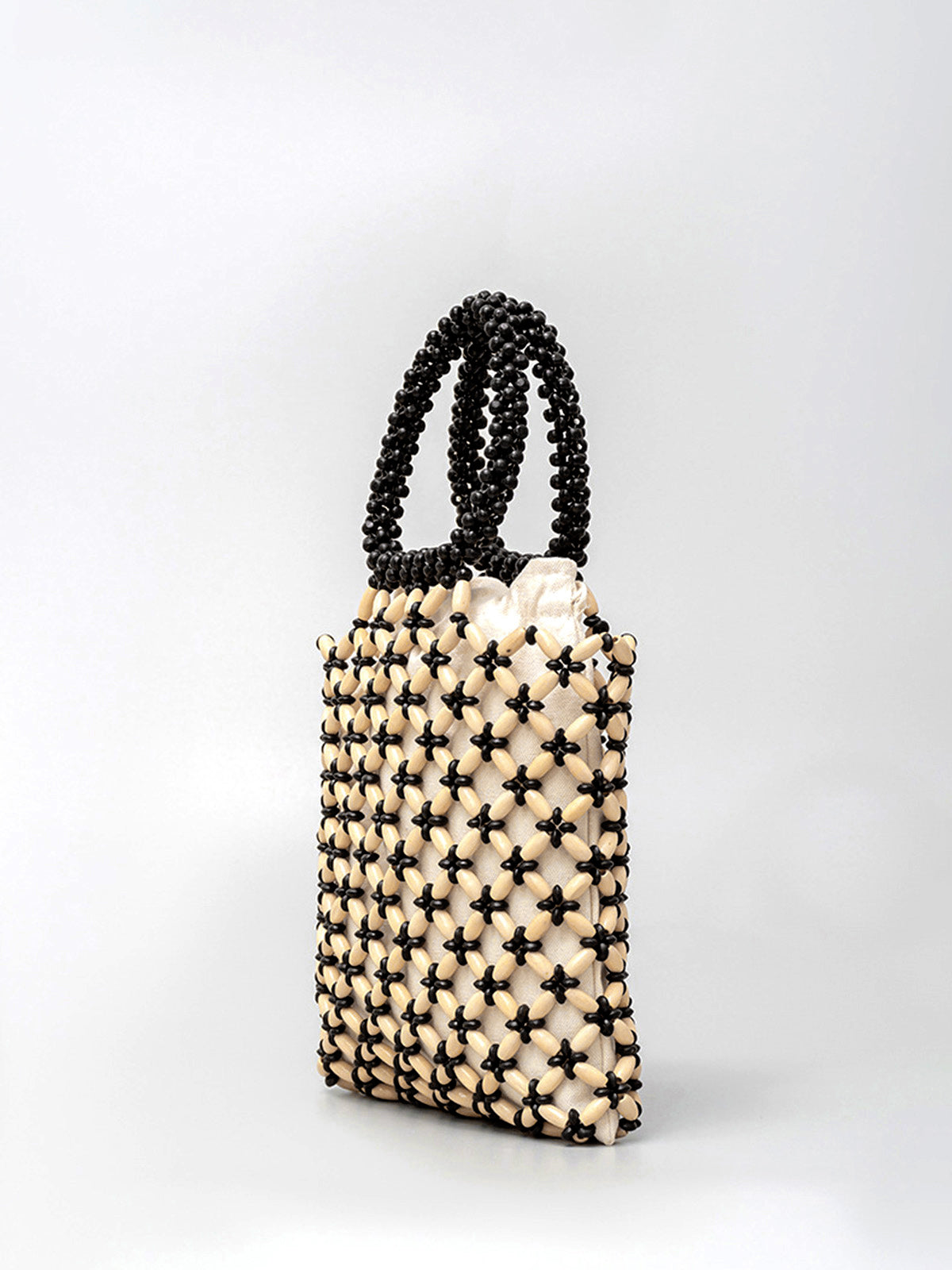 Chique Handtas met Contrastbinding en Mooie Houten Kralen