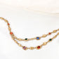 Kralenketting met gekleurde parels in dubbele rij - Elegant en uniek stijl