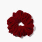 Chouchou van fluweel met varkentjesdetails voor een elegante uitstraling