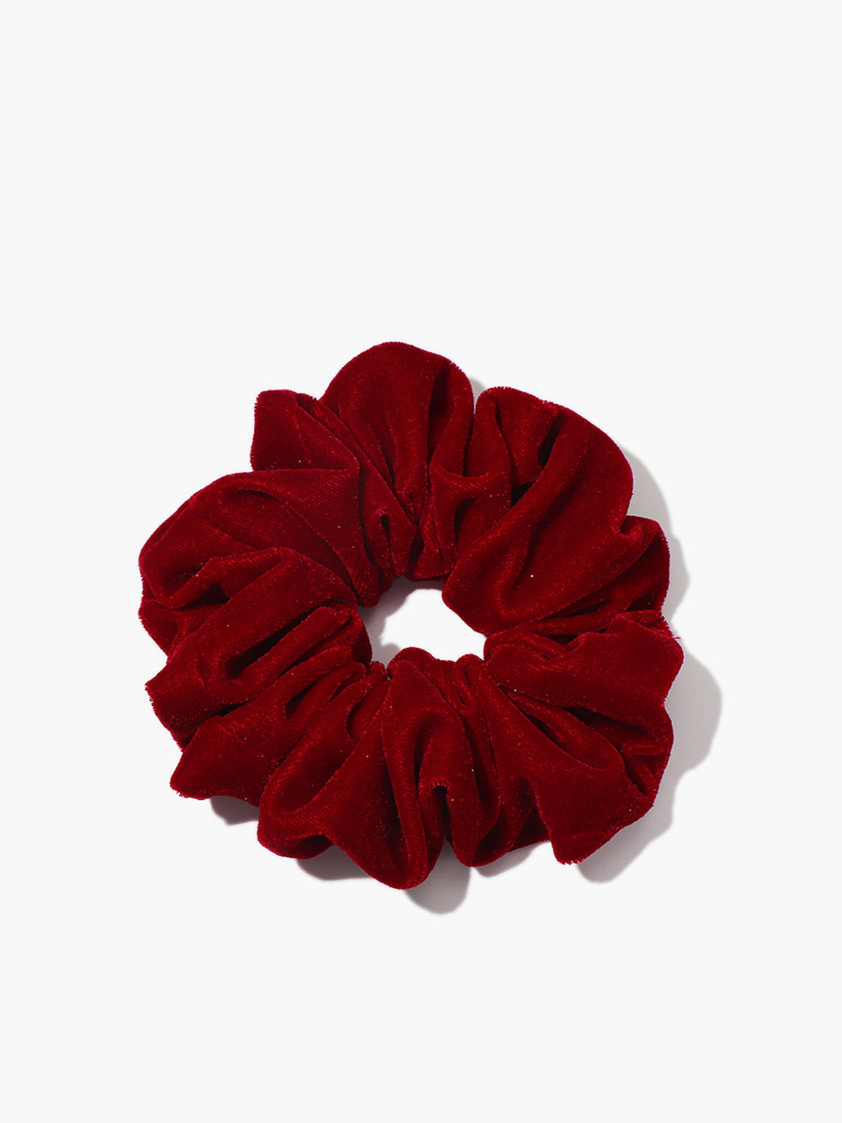 Chouchou van fluweel met varkentjesdetails voor een elegante uitstraling
