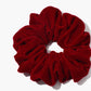 Chouchou van fluweel met varkentjesdetails voor een elegante uitstraling