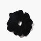 Chouchou van fluweel met varkentjesdetails voor een elegante uitstraling