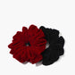 Chouchou van fluweel met varkentjesdetails voor een elegante uitstraling