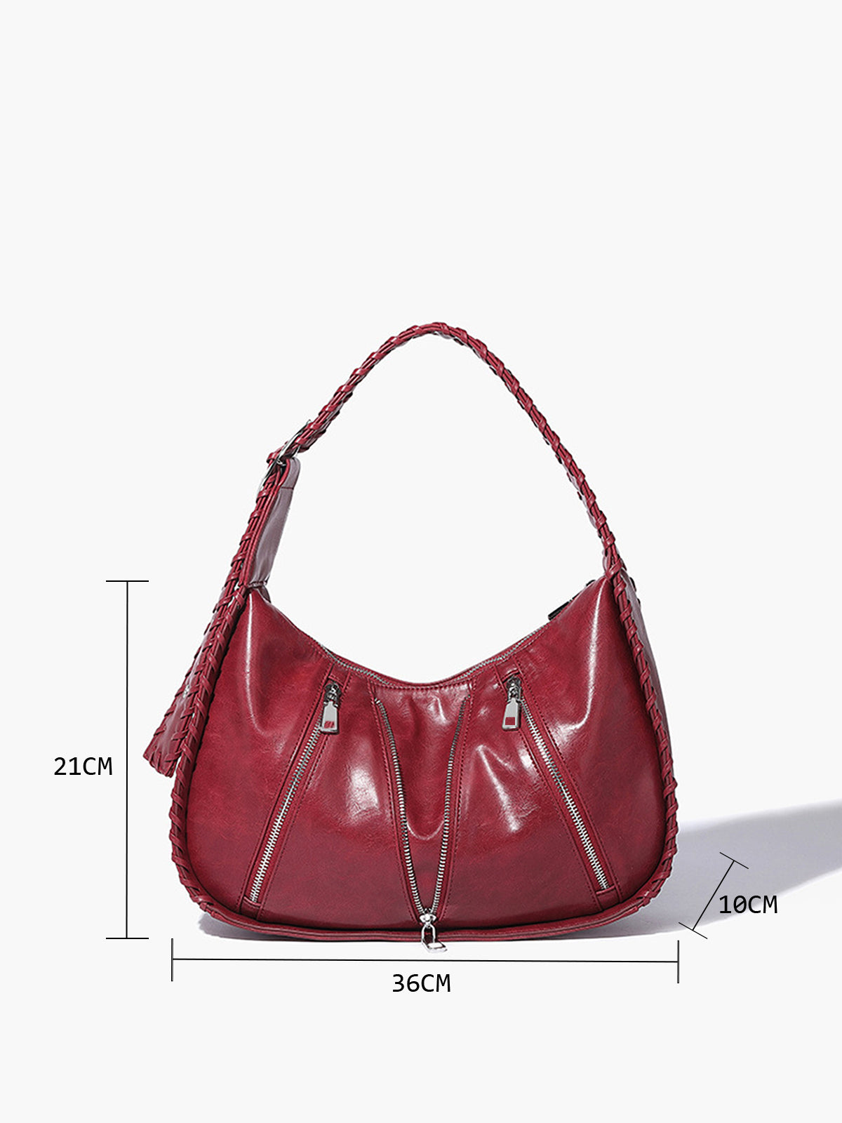 Trendy schoudertas met zachte ritssluiting en decoratief ontwerp onder de arm