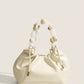 Chique Pastel Kralen Hobo Tas met Stijlvolle Handgreep