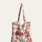 Luxe linnen schoudertas met elegante tropische bloemenprint