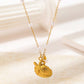 Chique gouden schelp- en zeesterrenhangers met elegante parels