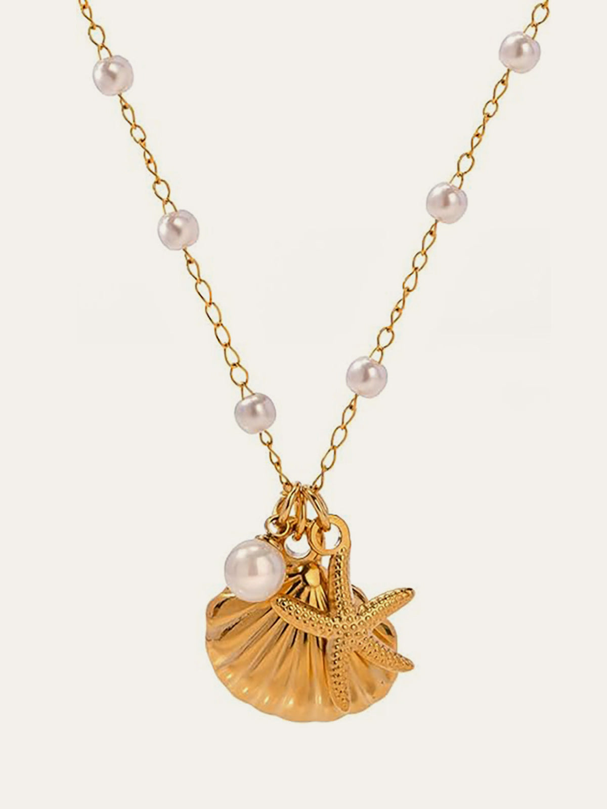 Chique gouden schelp- en zeesterrenhangers met elegante parels