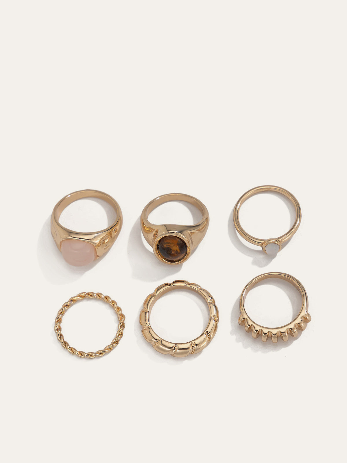 Set van 6 ringen met een mix van edelstenen en elegante texturen