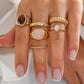Set van 6 ringen met een mix van edelstenen en elegante texturen