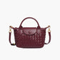 Elegante gevlochten mini-tas voor stijl en functionaliteit