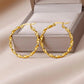 Elegante Gedraaide Gouden Hoepel Oorbellen - Kelly voor een Chique Look