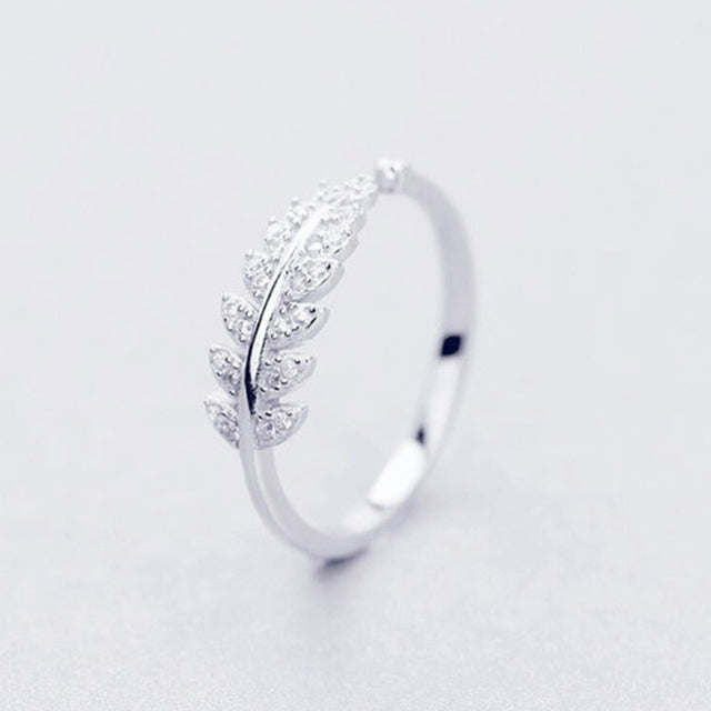 Verstelbare ring met heldergele groene varen in zilver